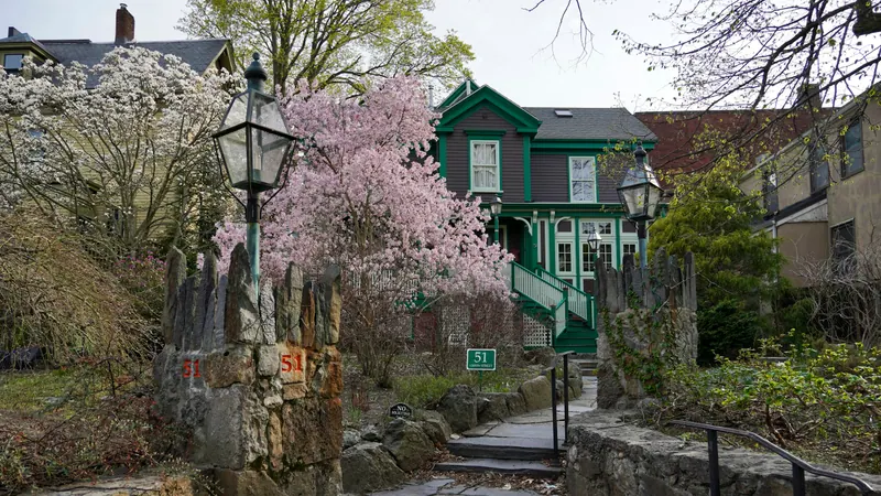 A charming home surrounded by spring blossoms