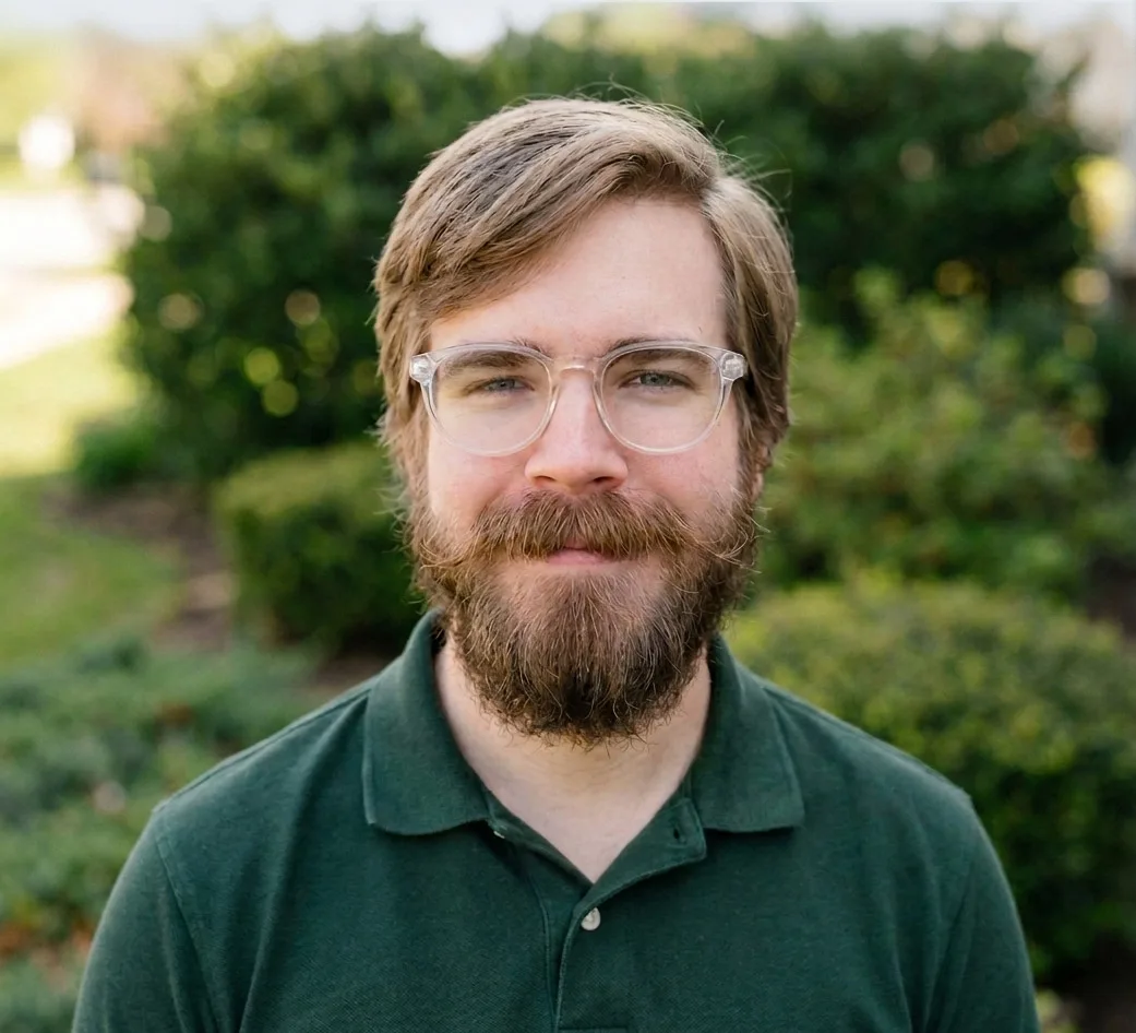 Professional headshot of Dylan Jenkins, licensed NC real estate broker